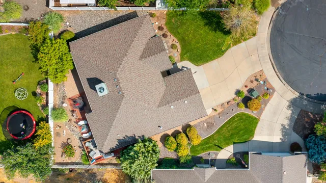 an outdoor space with seating space and garden