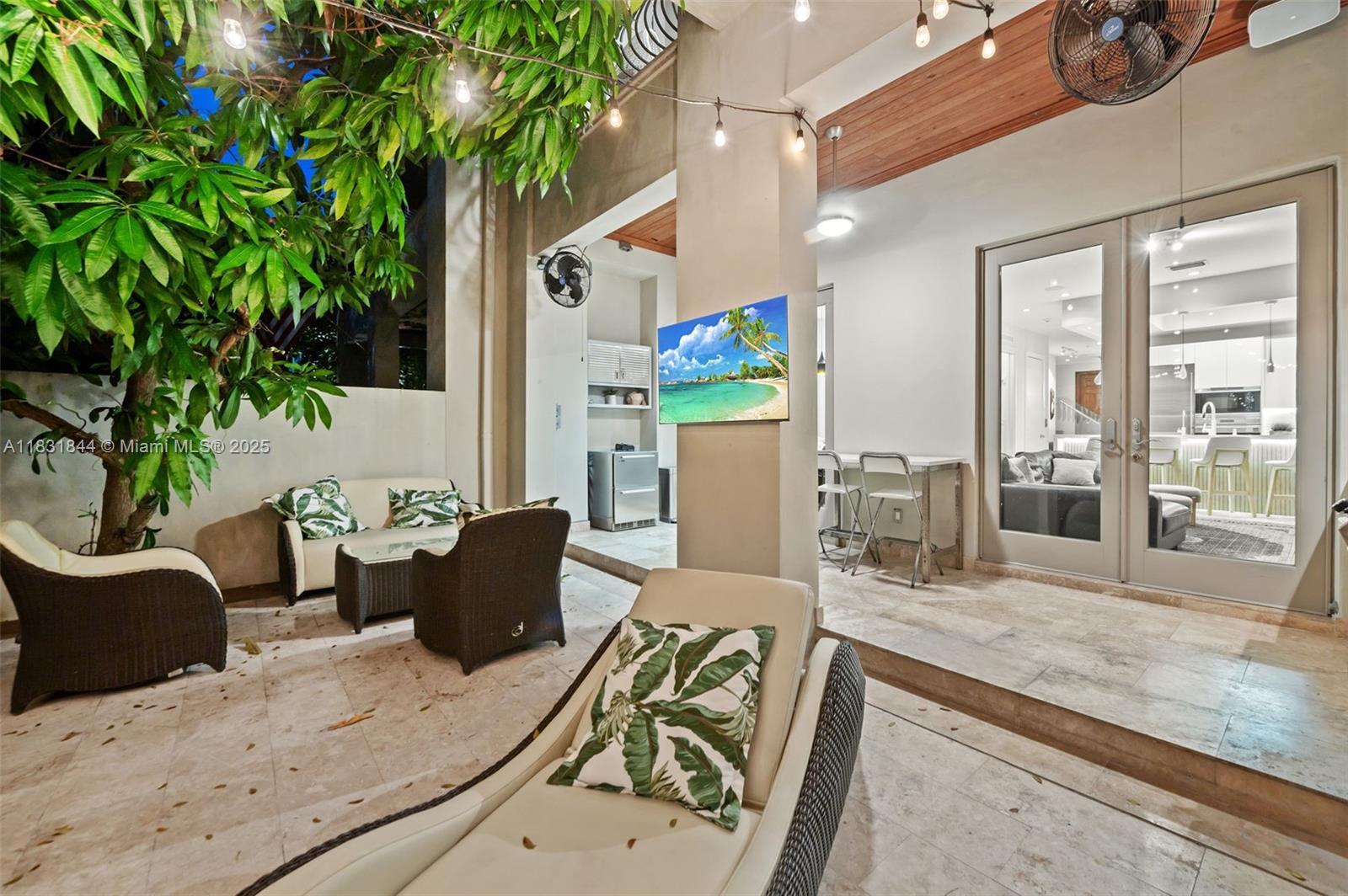 7560 Southwest 56th Court Miami, FL 33143 - Photo 20 of 60 a living room with furniture and a potted plant
