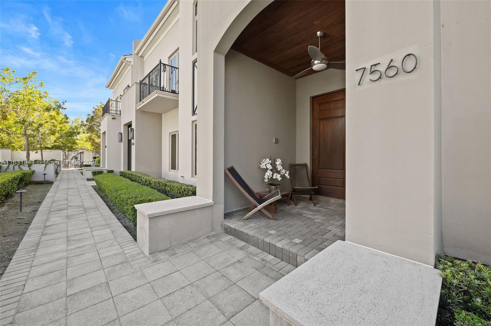 7560 Southwest 56th Court Miami, FL 33143 - Photo 2 of 60 a view of a house with backyard and sitting area