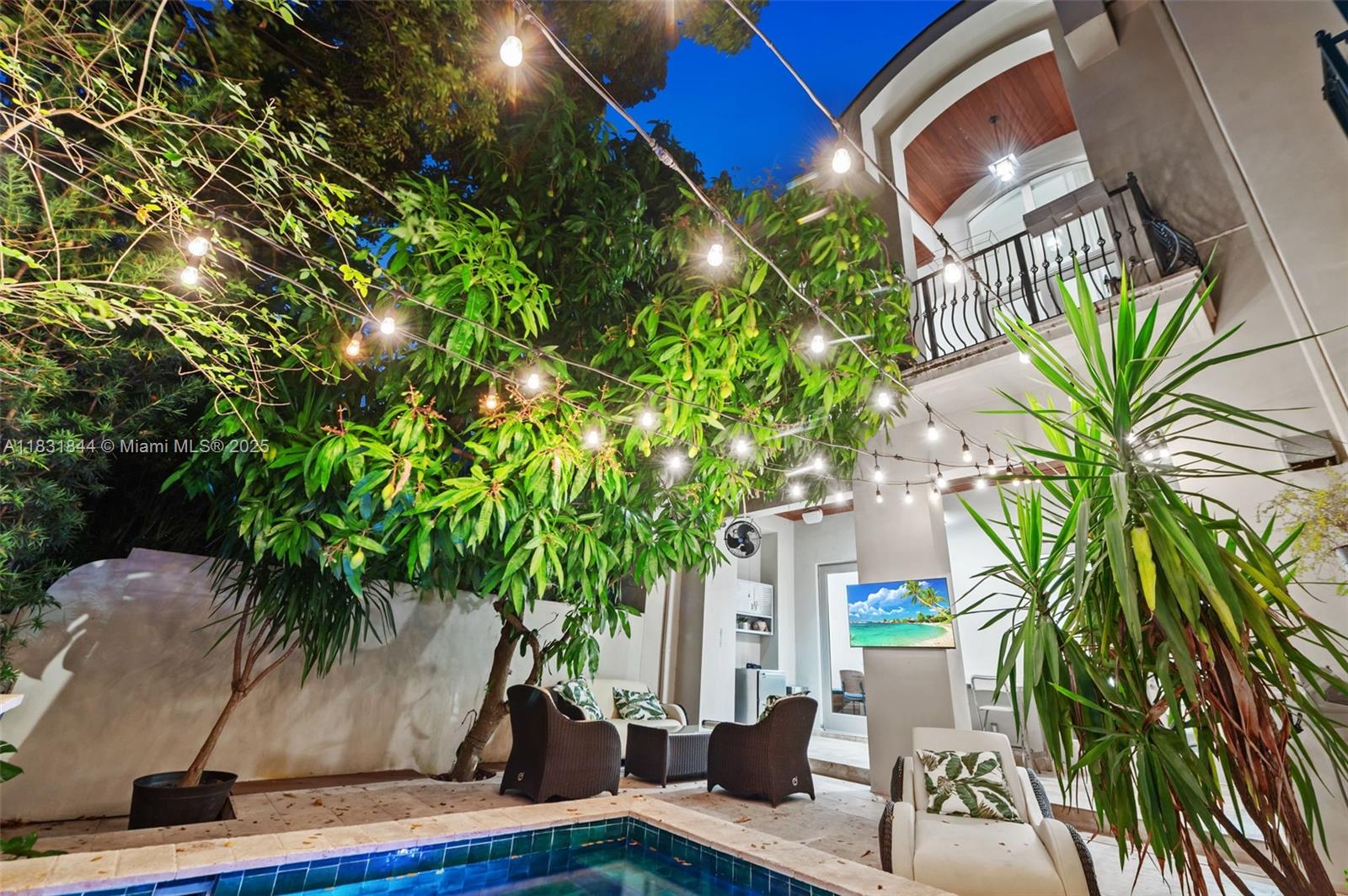 7560 Southwest 56th Court Miami, FL 33143 - Photo 25 of 60 a potted plant sitting in front of a house