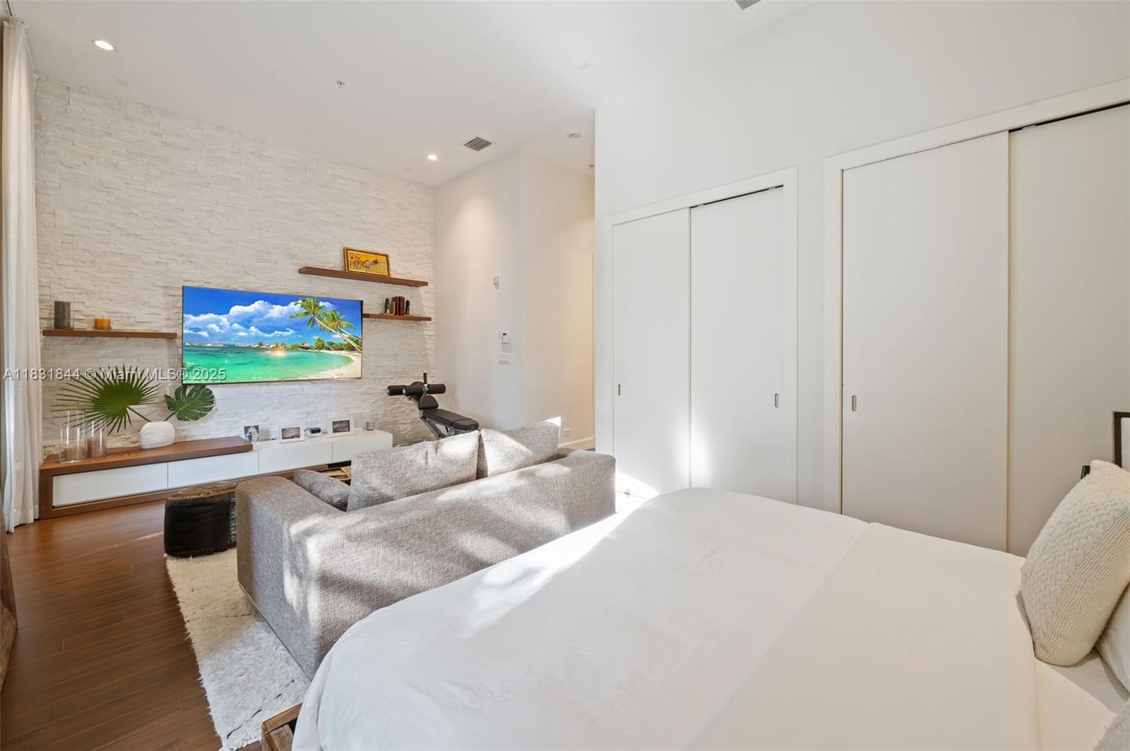 7560 Southwest 56th Court Miami, FL 33143 - Photo 27 of 60 a bedroom with a bed and a couch