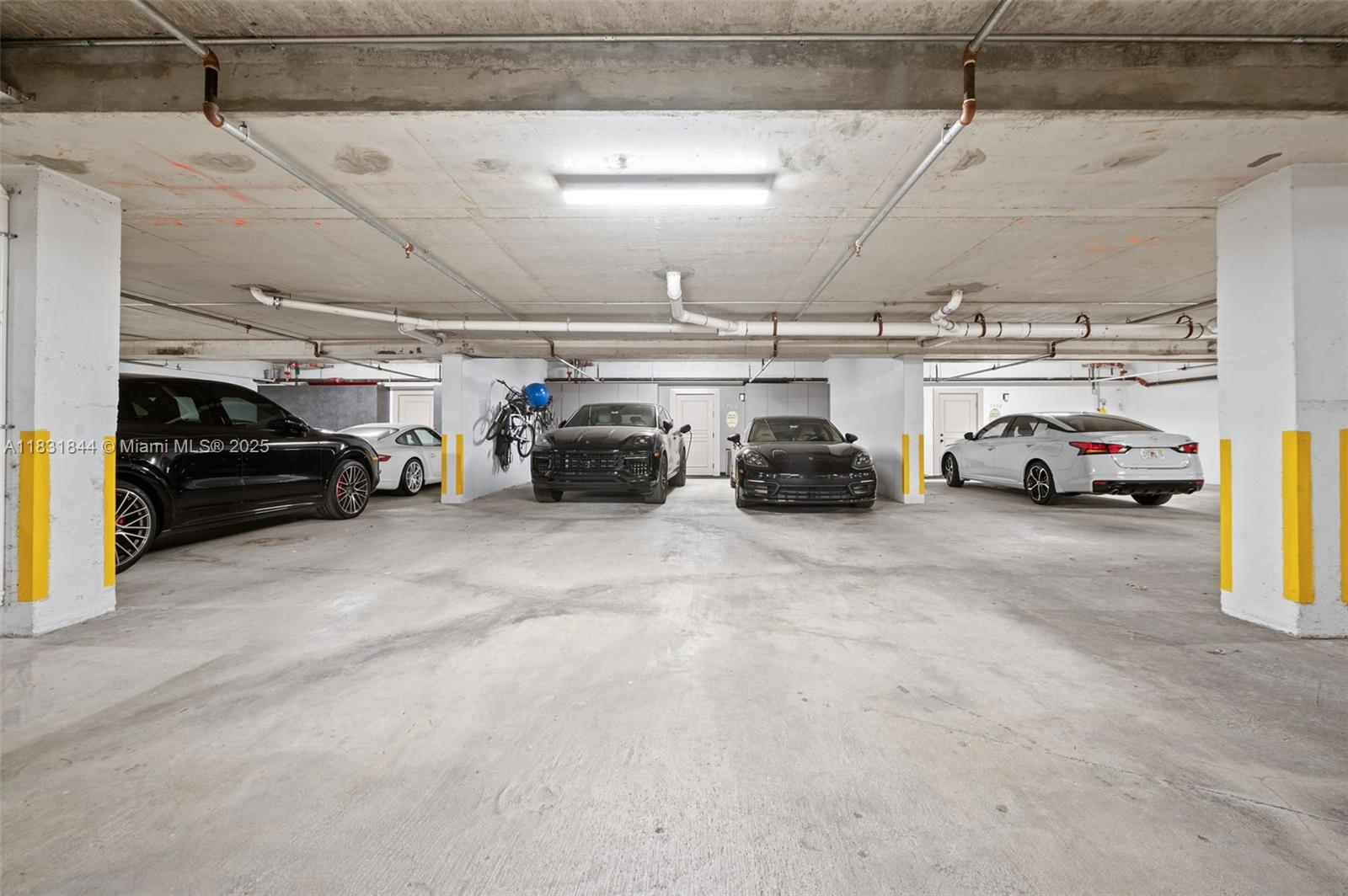 7560 Southwest 56th Court Miami, FL 33143 - Photo 42 of 60 a view of parking garage with cars