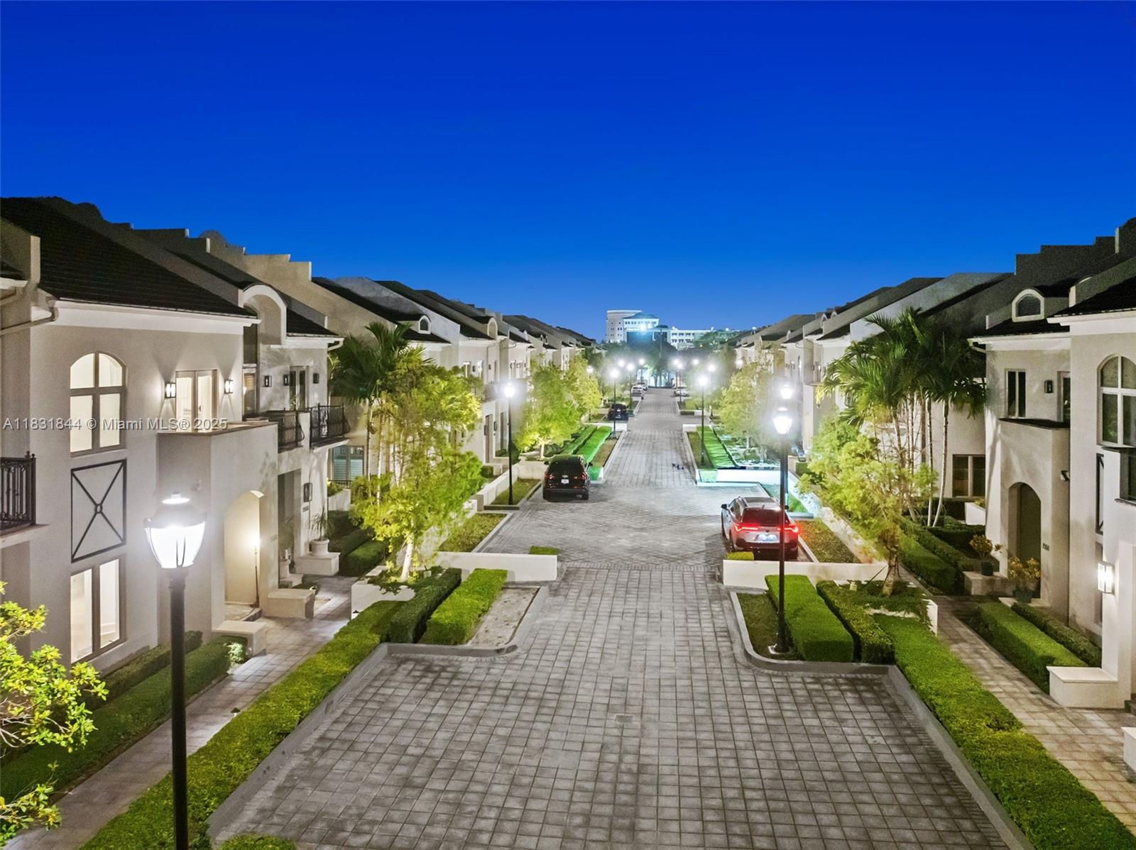 7560 Southwest 56th Court Miami, FL 33143 - Photo 43 of 60 a view of a street with potted plants