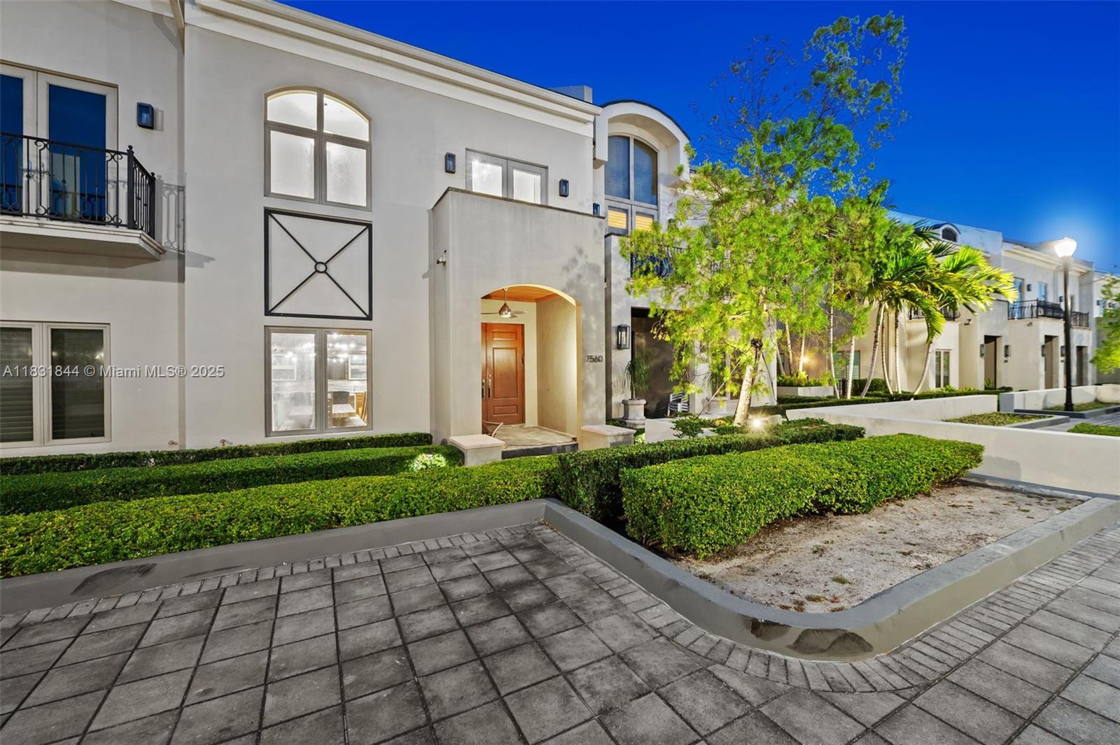 7560 Southwest 56th Court Miami, FL 33143 - Photo 47 of 60 a front view of a house with a yard