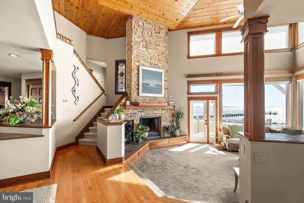a kitchen with stainless steel appliances granite countertop a sink and cabinets