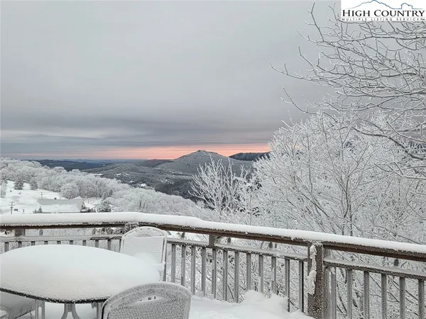 a front view of a house with a porch