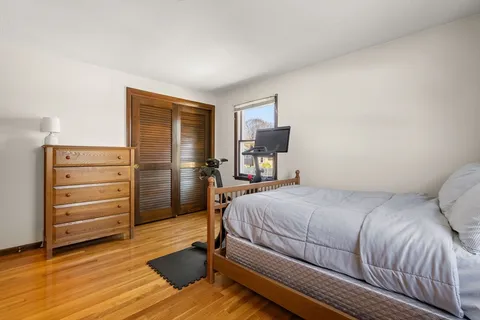 a bedroom with a bed and furniture