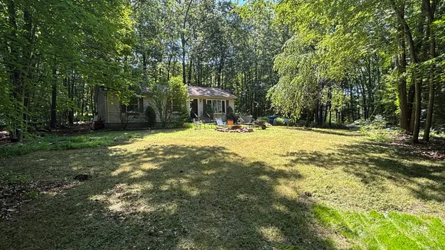 a view of a playground with basketball court