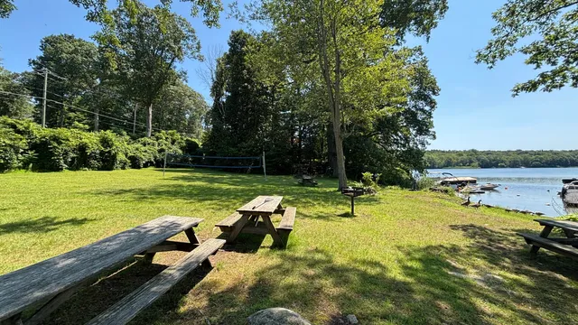 a view of a swimming pool with lounge chairs