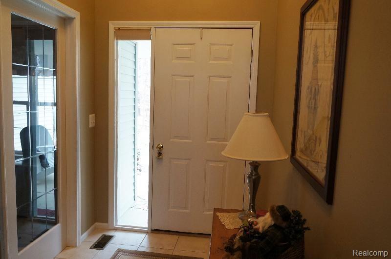 6872 General Squier Road Almont, MI 48003 - Photo 3 of 57 front entry door