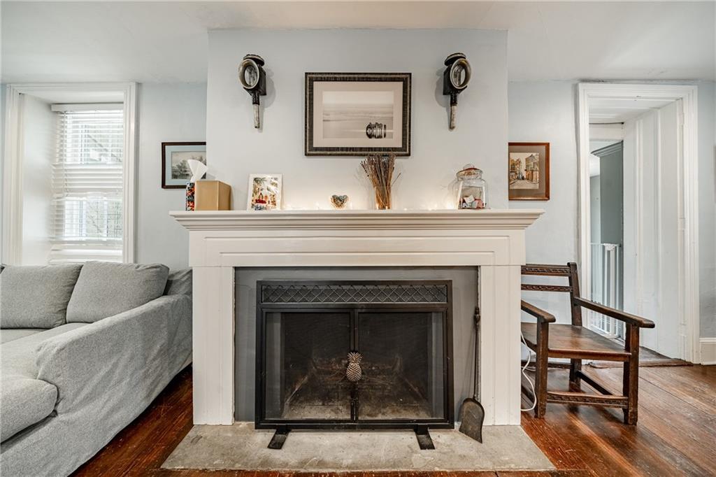 701 Oakbourne Road West Chester, PA 19382 - Photo 5 of 50 a living room with furniture and a fireplace