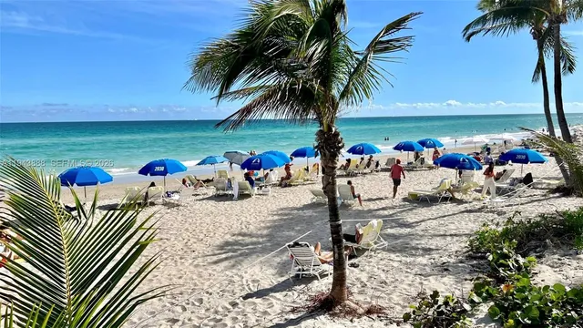 an outdoor space with furniture and garden view