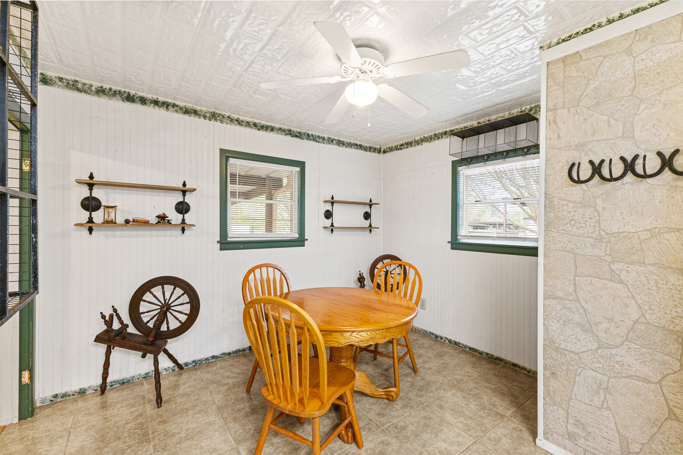 195 L County Road Jewett, TX 75846 - Photo 10 of 26 a view of a dining room with furniture and wooden floor
