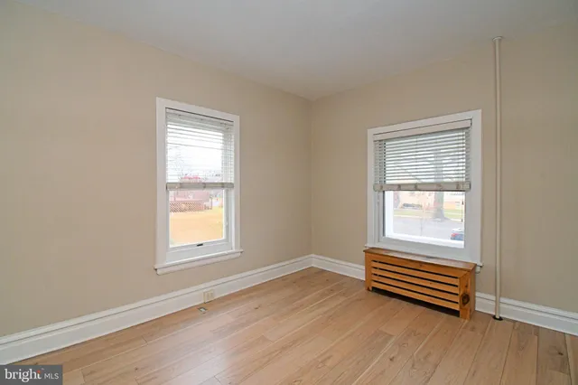 a kitchen with stainless steel appliances a refrigerator and a stove top oven