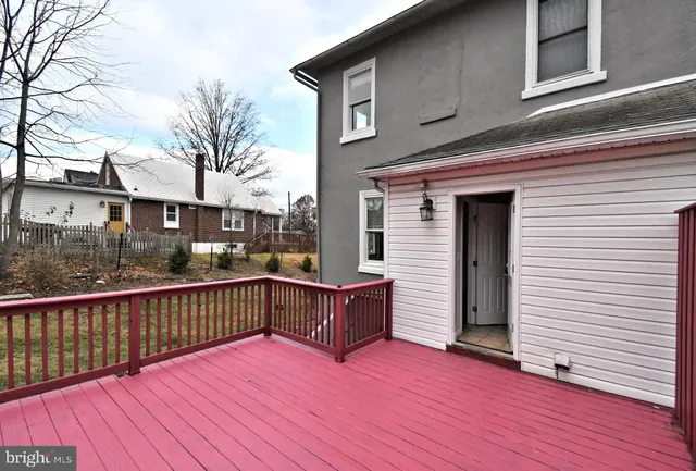 a view of a deck with mountain view and lake view