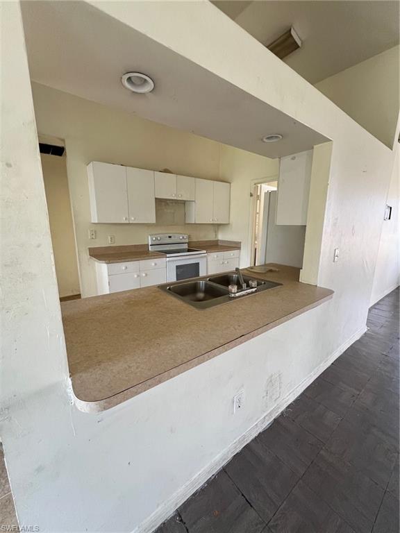 3513 30th Street Southwest Lehigh Acres, FL 33976 - Photo 17 of 29 a view of kitchen with stainless steel appliances granite countertop refrigerator sink and stove