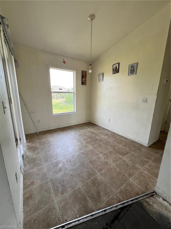 3513 30th Street Southwest Lehigh Acres, FL 33976 - Photo 19 of 29 a view of room with a window