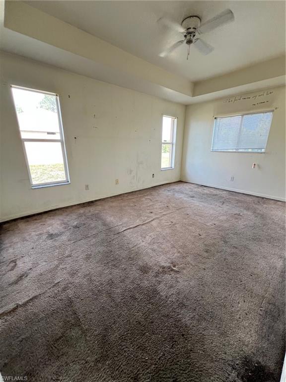 3513 30th Street Southwest Lehigh Acres, FL 33976 - Photo 20 of 29 a view of a livingroom with a window