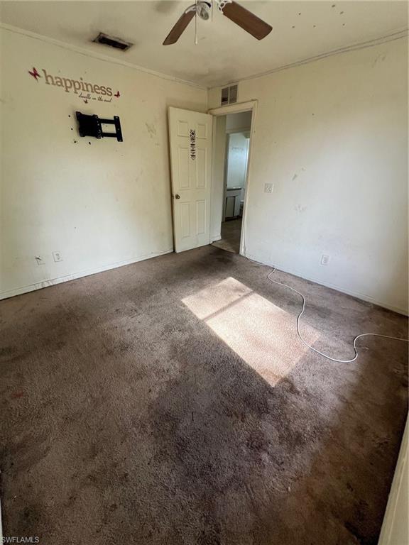 3513 30th Street Southwest Lehigh Acres, FL 33976 - Photo 25 of 29 a view of a garage