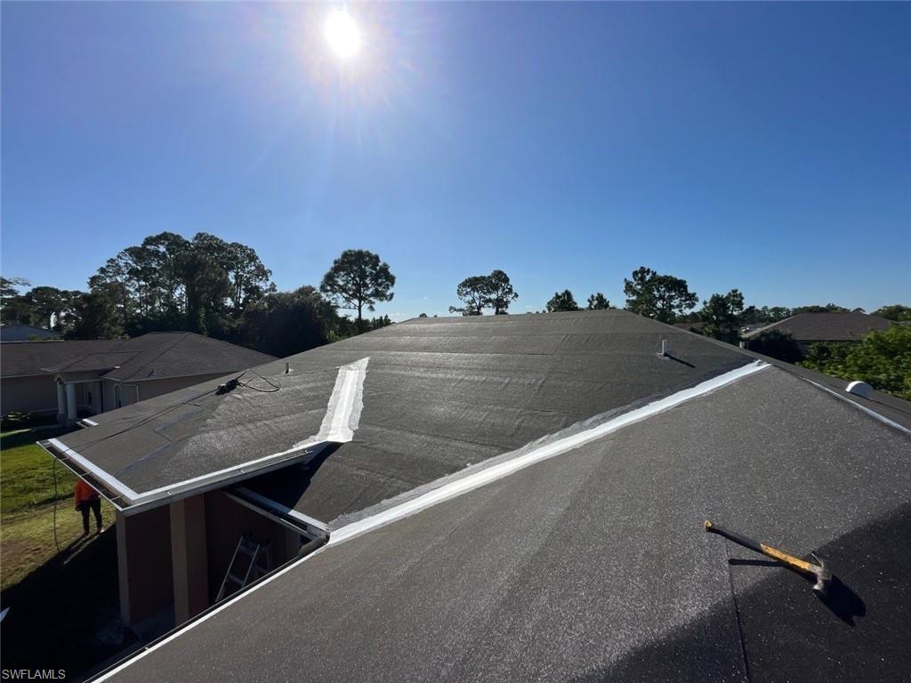 3513 30th Street Southwest Lehigh Acres, FL 33976 - Photo 6 of 29 a view of a tennis court