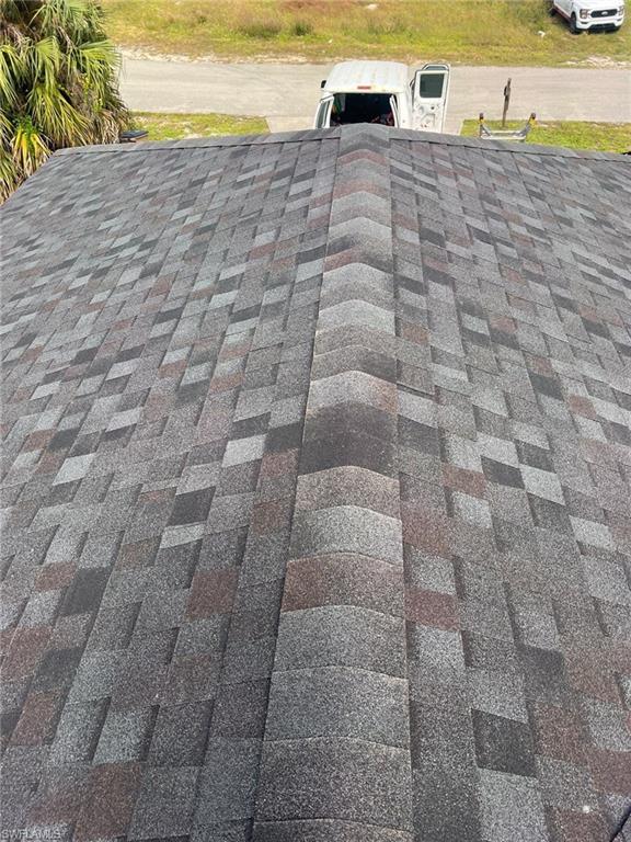 3513 30th Street Southwest Lehigh Acres, FL 33976 - Photo 10 of 29 a picture of a bathroom with a shower