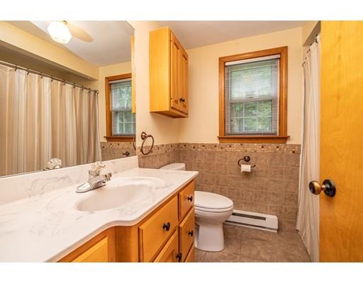 117 Woodland Road Springfield, MA 01129 - Photo 15 of 30 a bathroom with a sink a toilet and a mirror