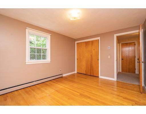 117 Woodland Road Springfield, MA 01129 - Photo 24 of 30 a view of an empty room with wooden floor
