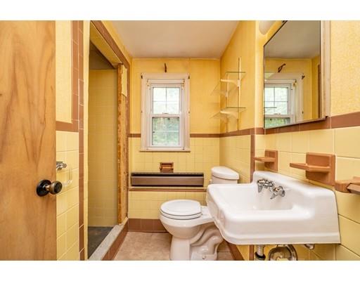 117 Woodland Road Springfield, MA 01129 - Photo 29 of 30 a bathroom with a sink a toilet and shower