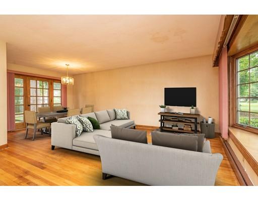 117 Woodland Road Springfield, MA 01129 - Photo 8 of 30 a living room with furniture and a flat screen tv
