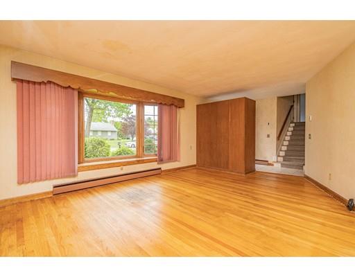 117 Woodland Road Springfield, MA 01129 - Photo 10 of 30 a view of an empty room with a window