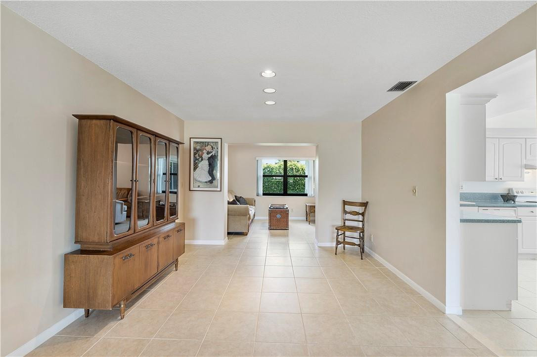 6419 Hitchin Post Way Delray Beach, FL 33484 - Photo 12 of 33 a living room with furniture and a large window