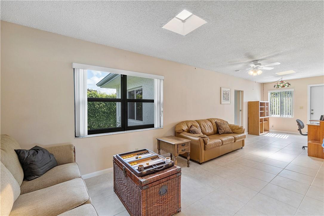 6419 Hitchin Post Way Delray Beach, FL 33484 - Photo 20 of 33 a living room with furniture and a window