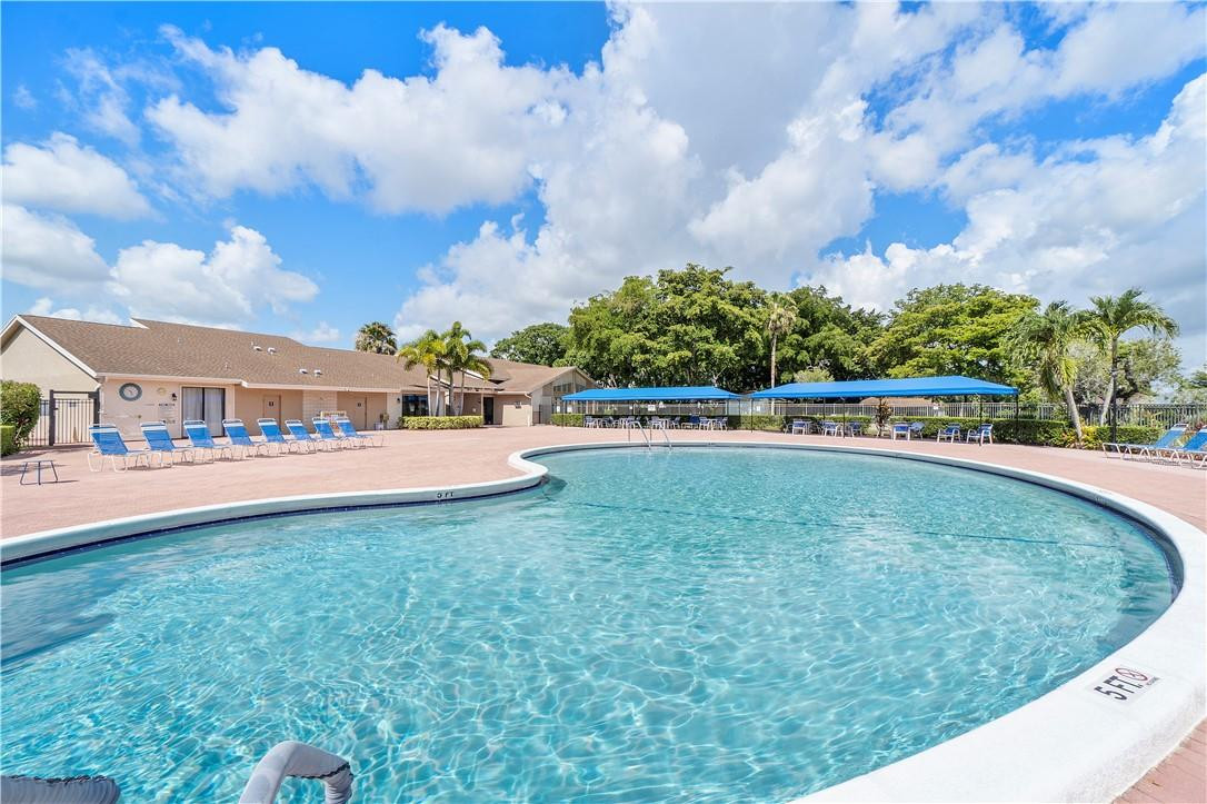 6419 Hitchin Post Way Delray Beach, FL 33484 - Photo 30 of 33 a view of outdoor space yard and swimming pool
