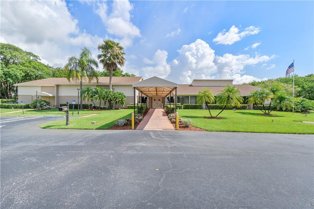 6419 Hitchin Post Way Delray Beach, FL 33484 - Photo 32 of 33 a view of a house with a big yard
