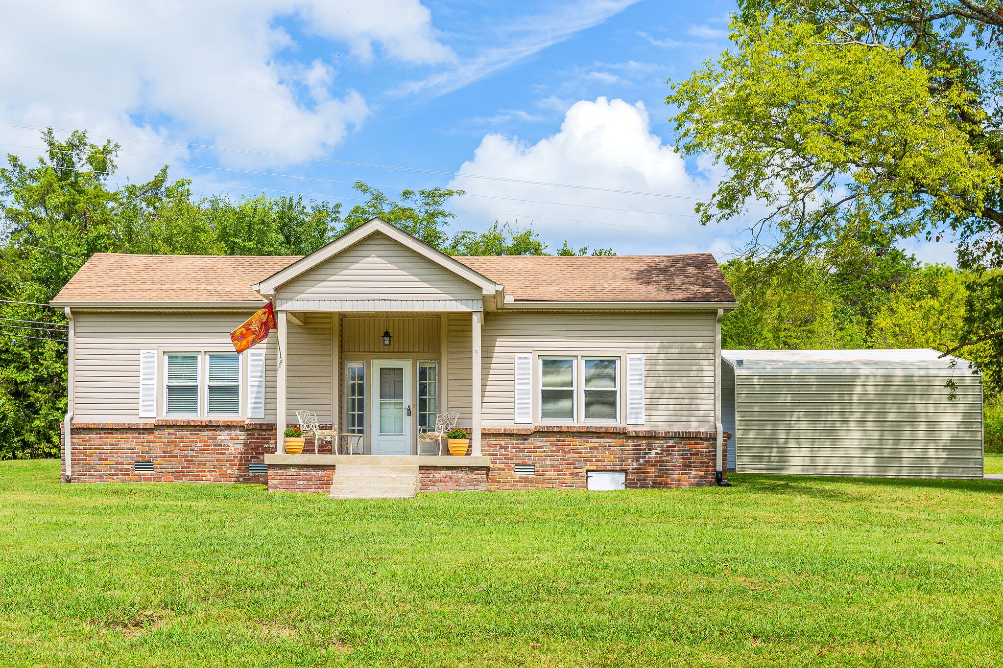 675 Holloway Road Lebanon, TN 37090 - Photo 1 of 32 a view of a house with a yard and sitting area
