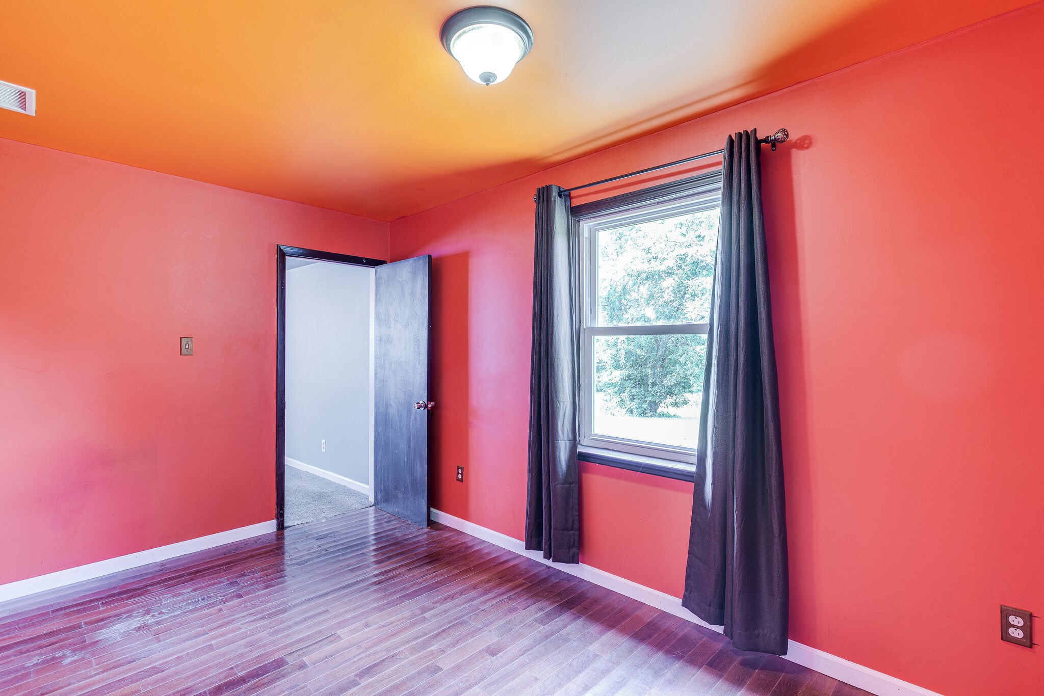 675 Holloway Road Lebanon, TN 37090 - Photo 21 of 32 a view of a room with wooden floor and windows