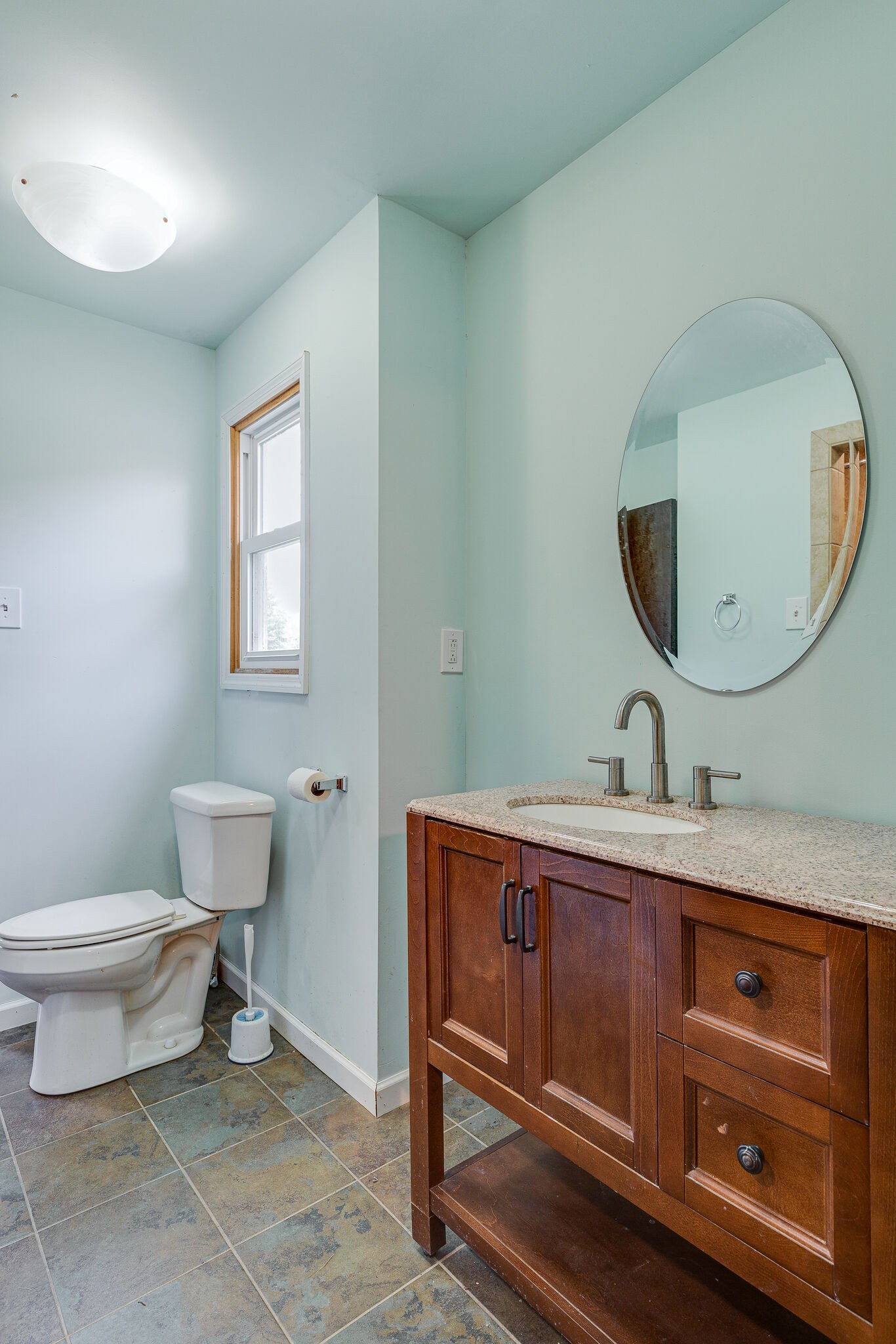 675 Holloway Road Lebanon, TN 37090 - Photo 25 of 32 a bathroom with a toilet sink and mirror