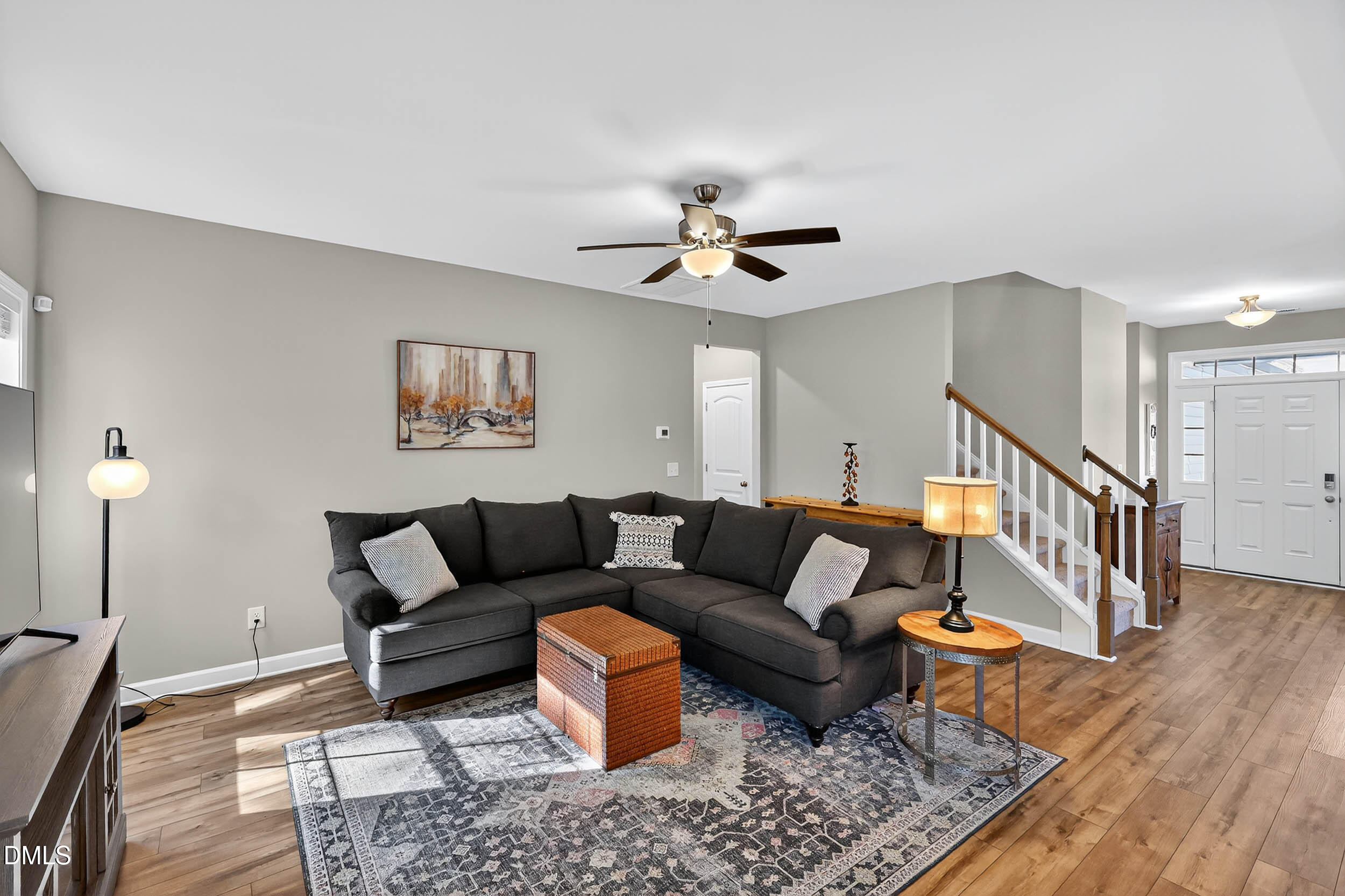 520 Husketh Road Youngsville, NC 27596 - Photo 18 of 63 a living room with furniture and a rug