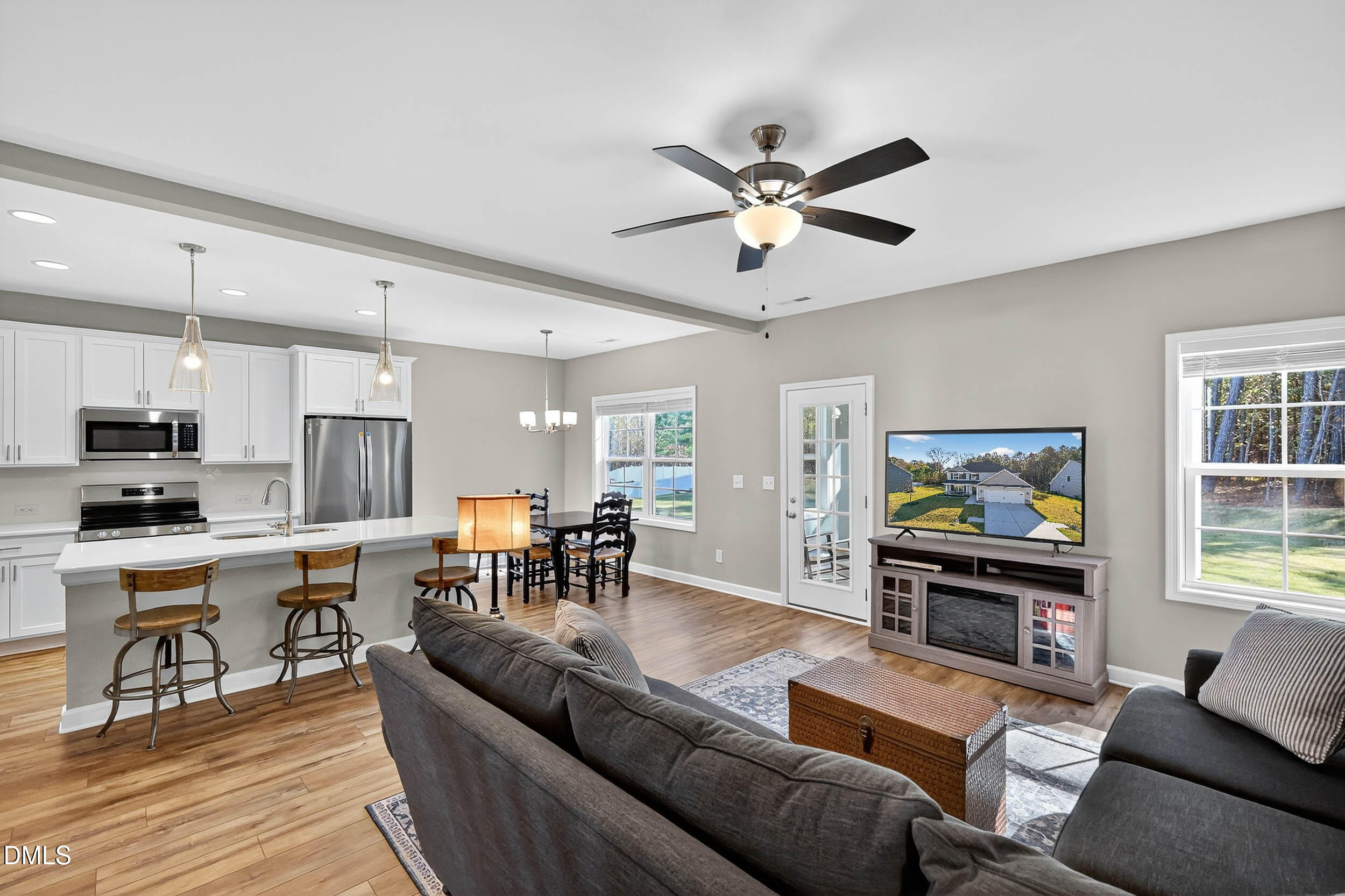 520 Husketh Road Youngsville, NC 27596 - Photo 19 of 63 a living room with furniture kitchen view and a window