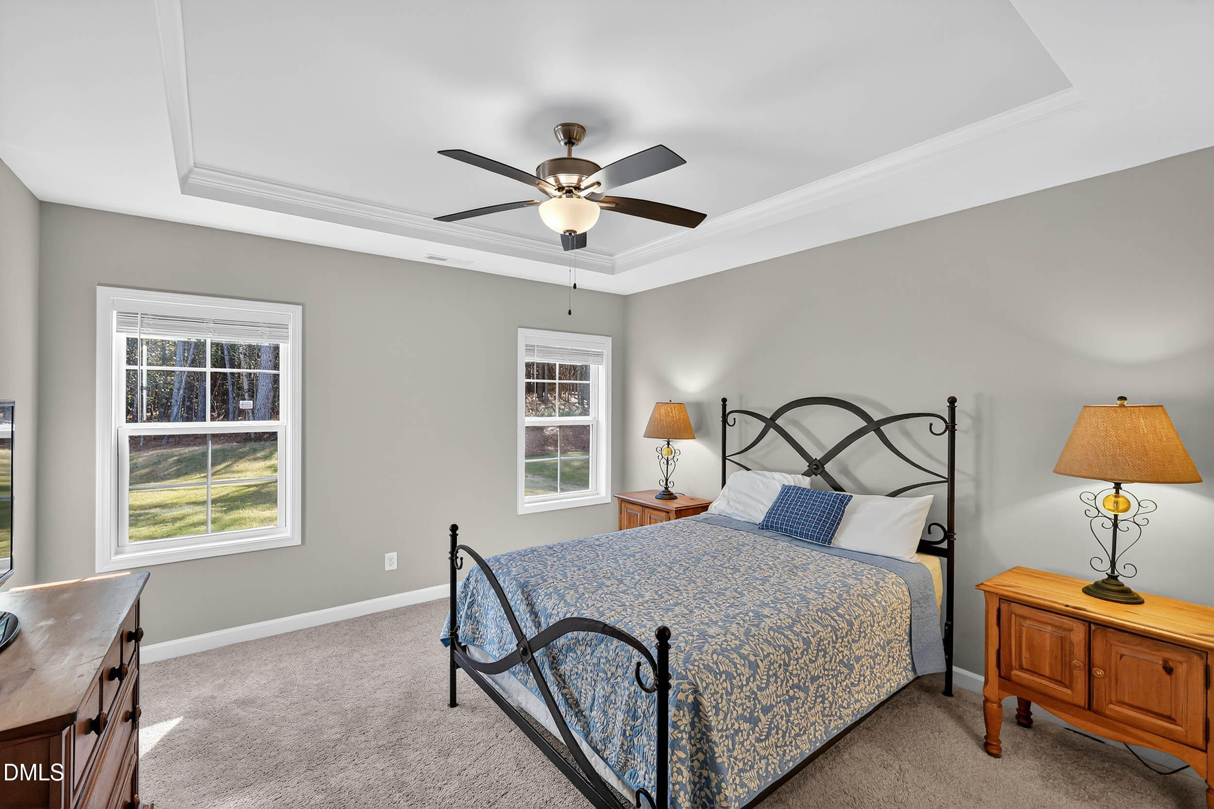 520 Husketh Road Youngsville, NC 27596 - Photo 21 of 63 a bedroom with a bed dresser and a window