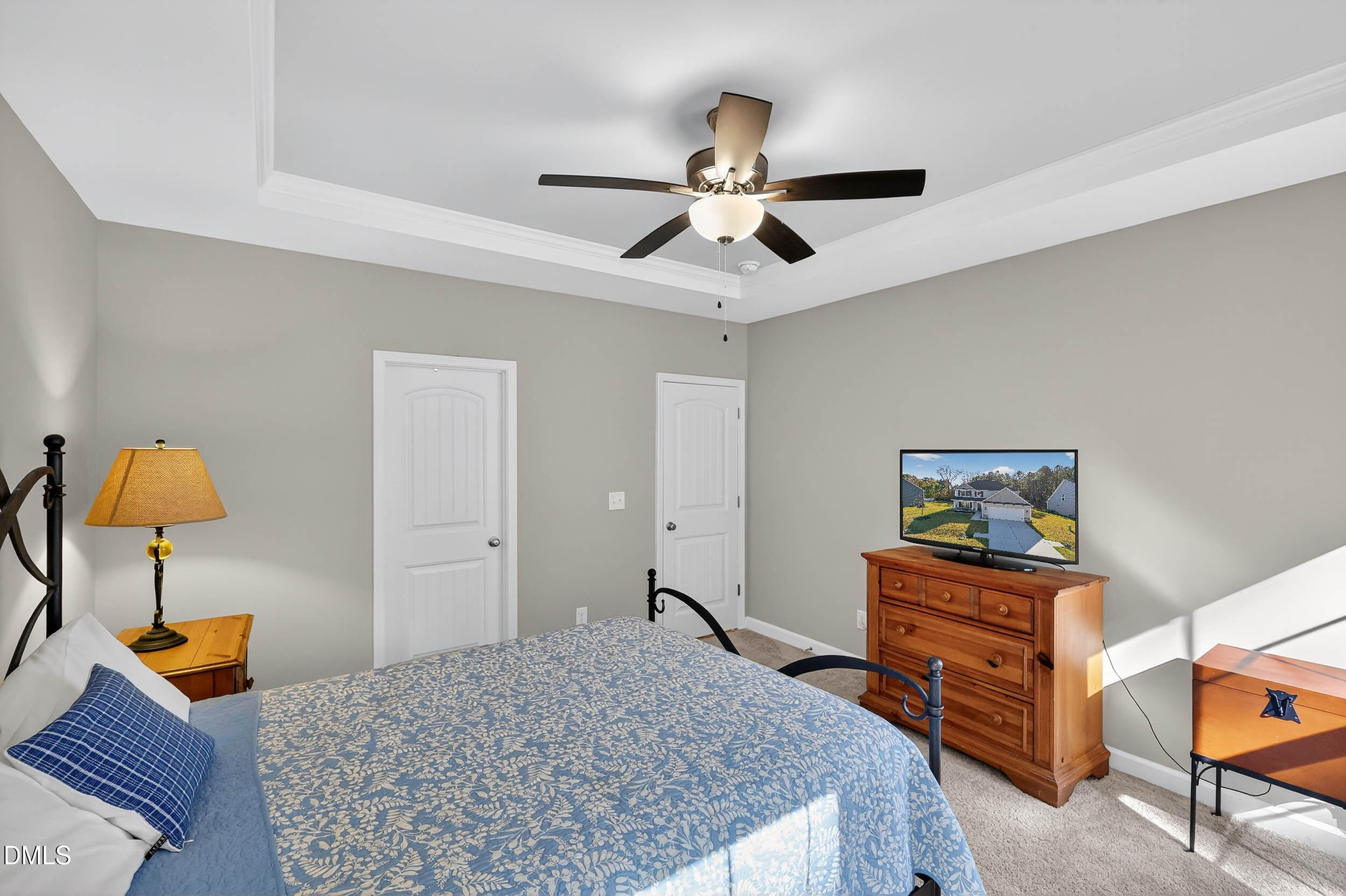 520 Husketh Road Youngsville, NC 27596 - Photo 24 of 63 a bedroom with a bed and dresser