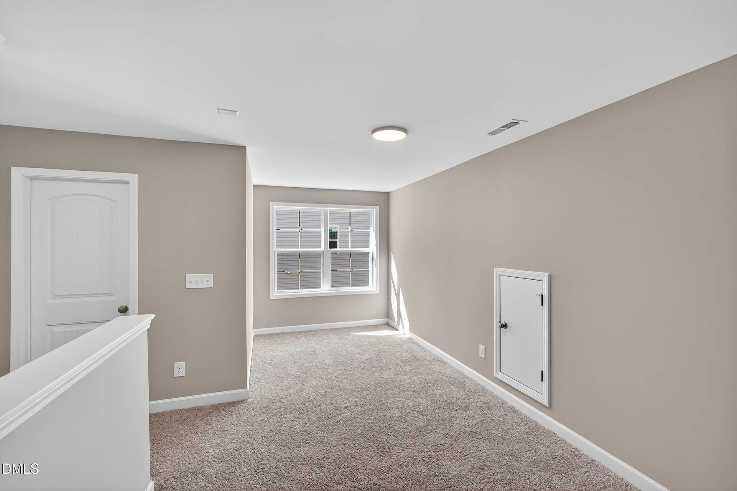 520 Husketh Road Youngsville, NC 27596 - Photo 32 of 63 a view of an empty room with a window