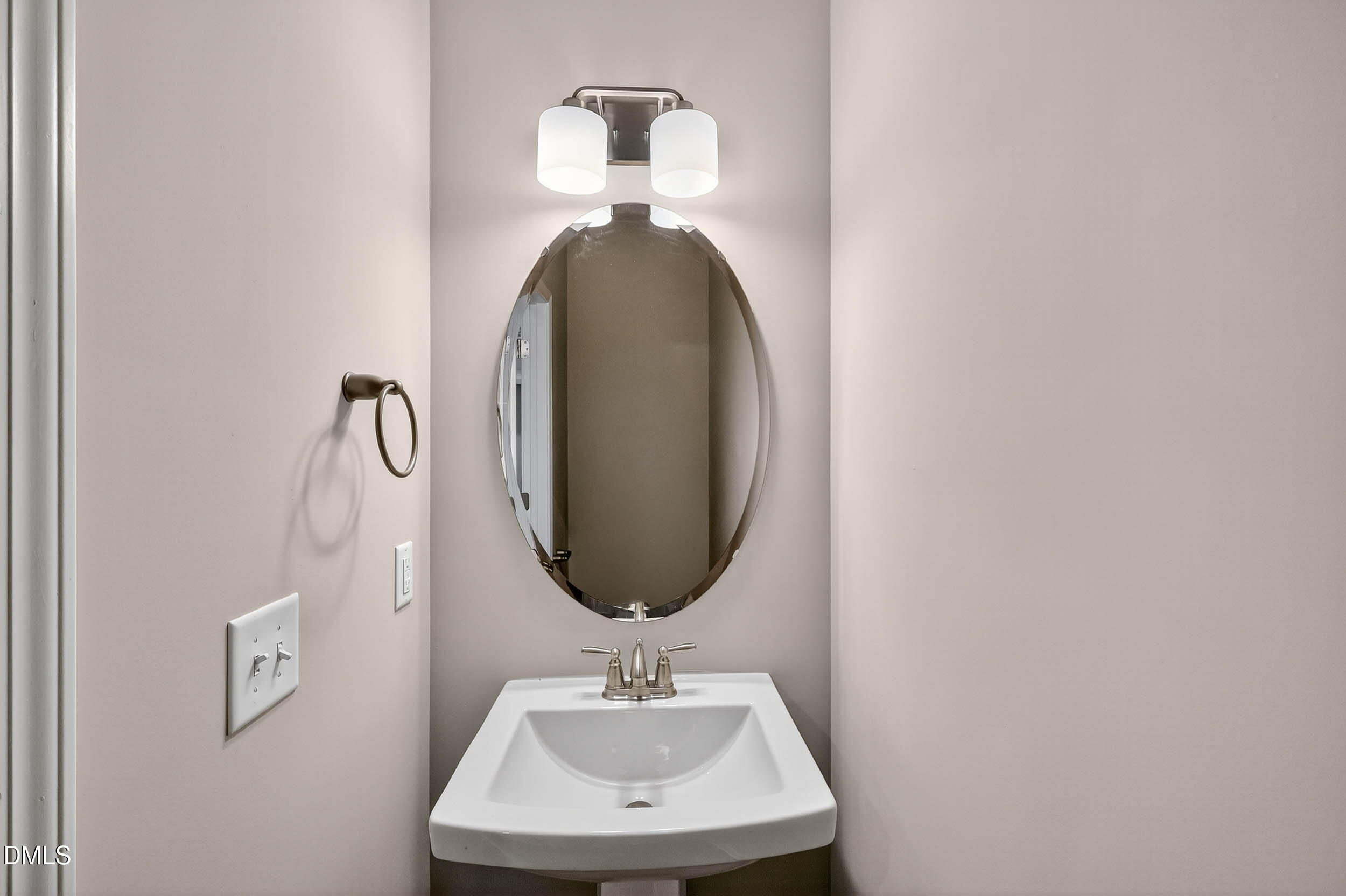 520 Husketh Road Youngsville, NC 27596 - Photo 32 of 63 a bathroom with a sink and a mirror