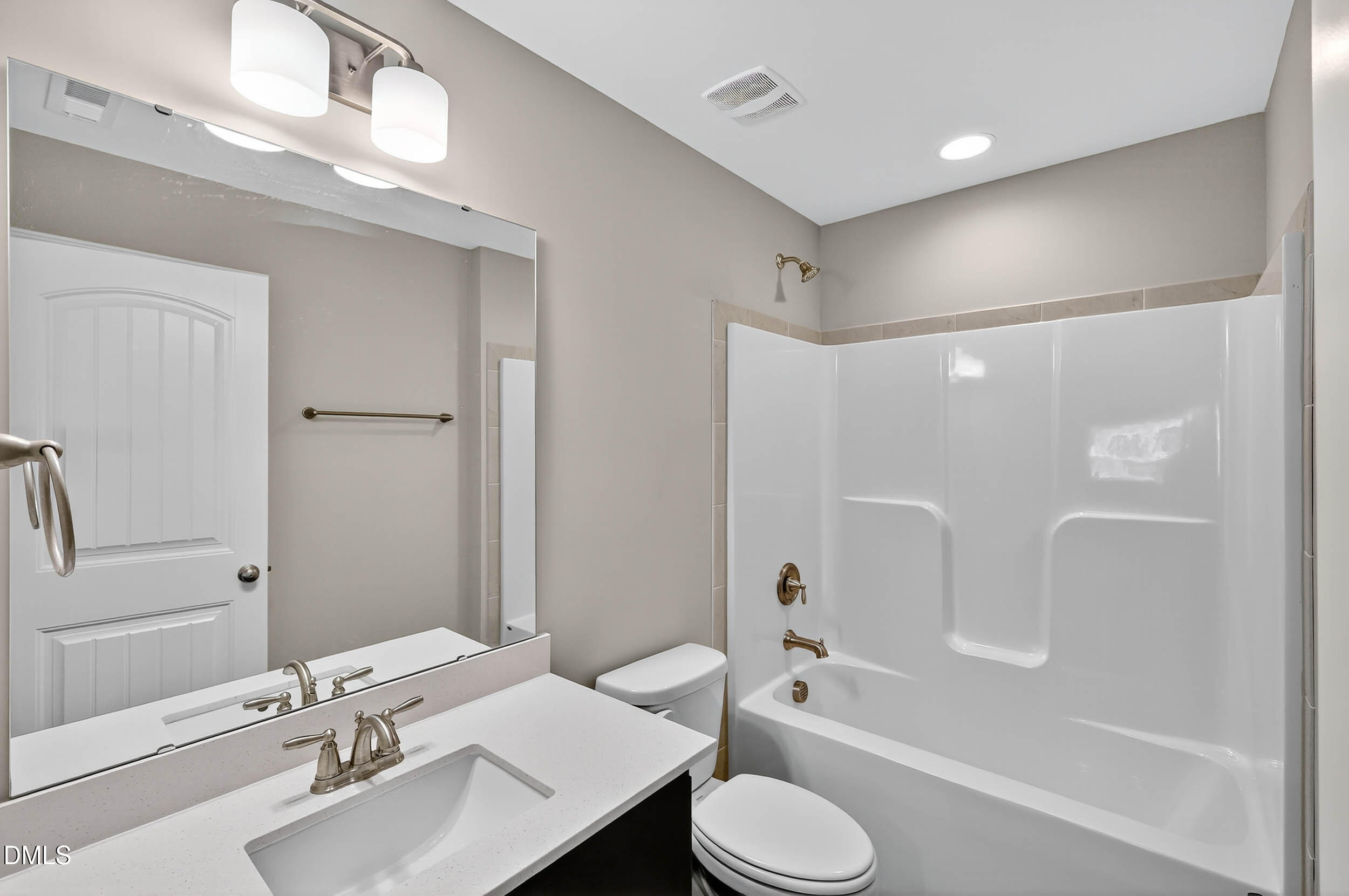520 Husketh Road Youngsville, NC 27596 - Photo 42 of 63 a bathroom with a sink toilet tub and shower