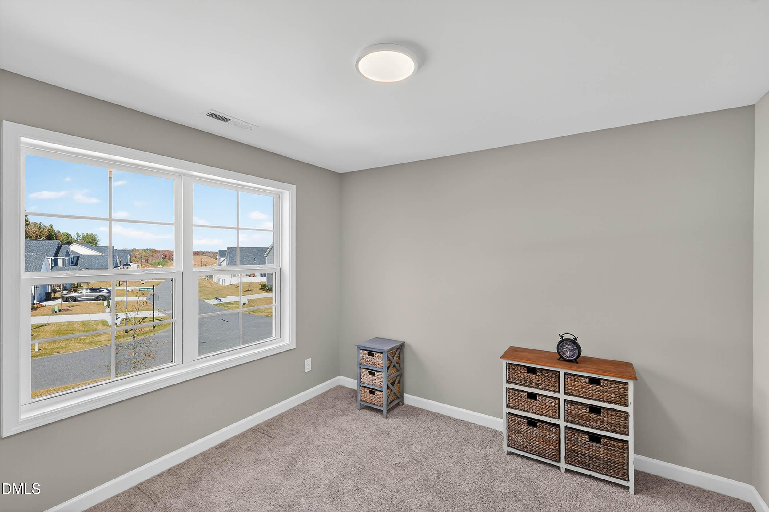 520 Husketh Road Youngsville, NC 27596 - Photo 46 of 63 a room with a window