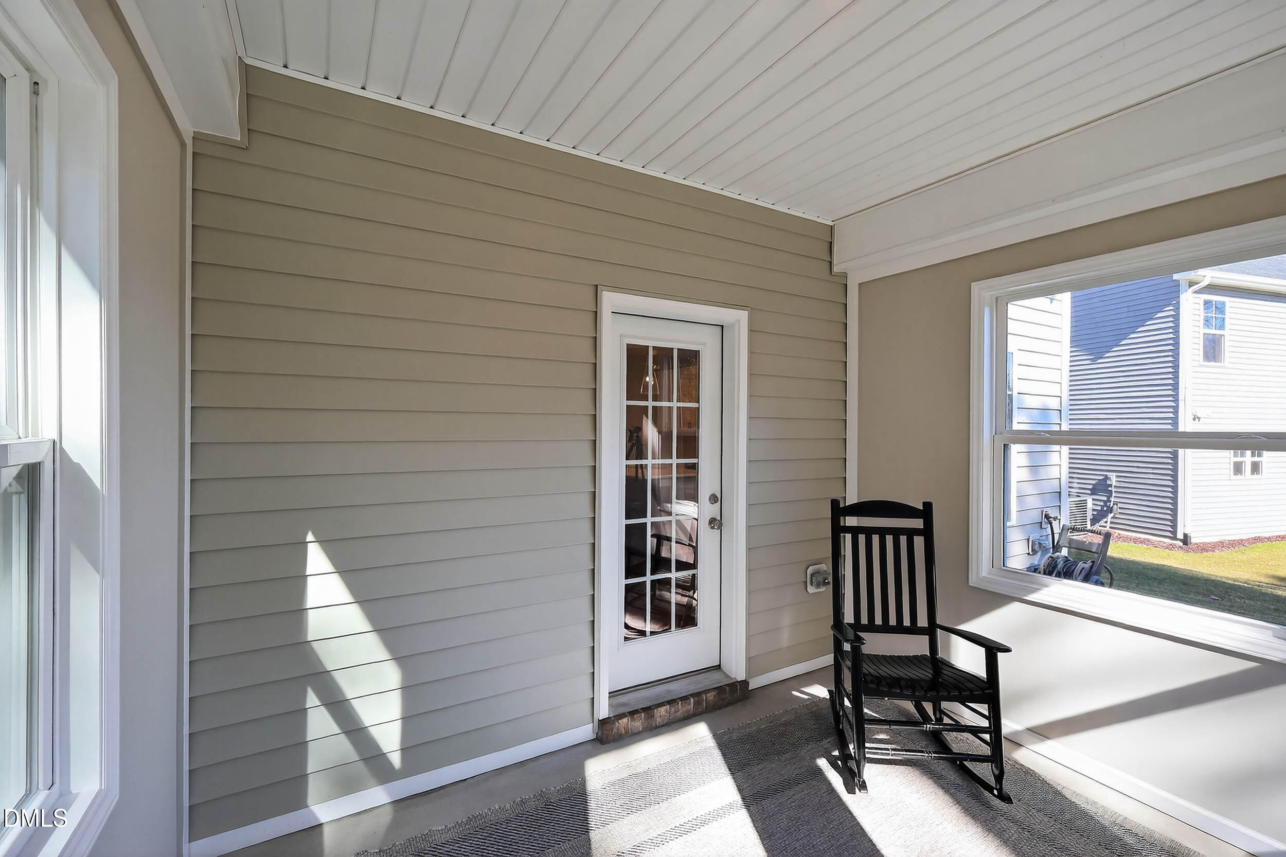 520 Husketh Road Youngsville, NC 27596 - Photo 49 of 63 a view of a livingroom with furniture and floor to ceiling window