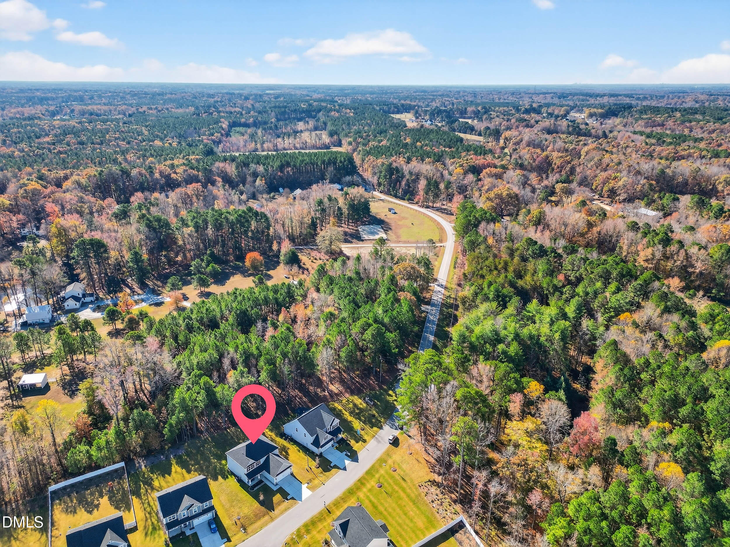 520 Husketh Road Youngsville, NC 27596 - Photo 59 of 63 an aerial view of residential houses with outdoor space and trees