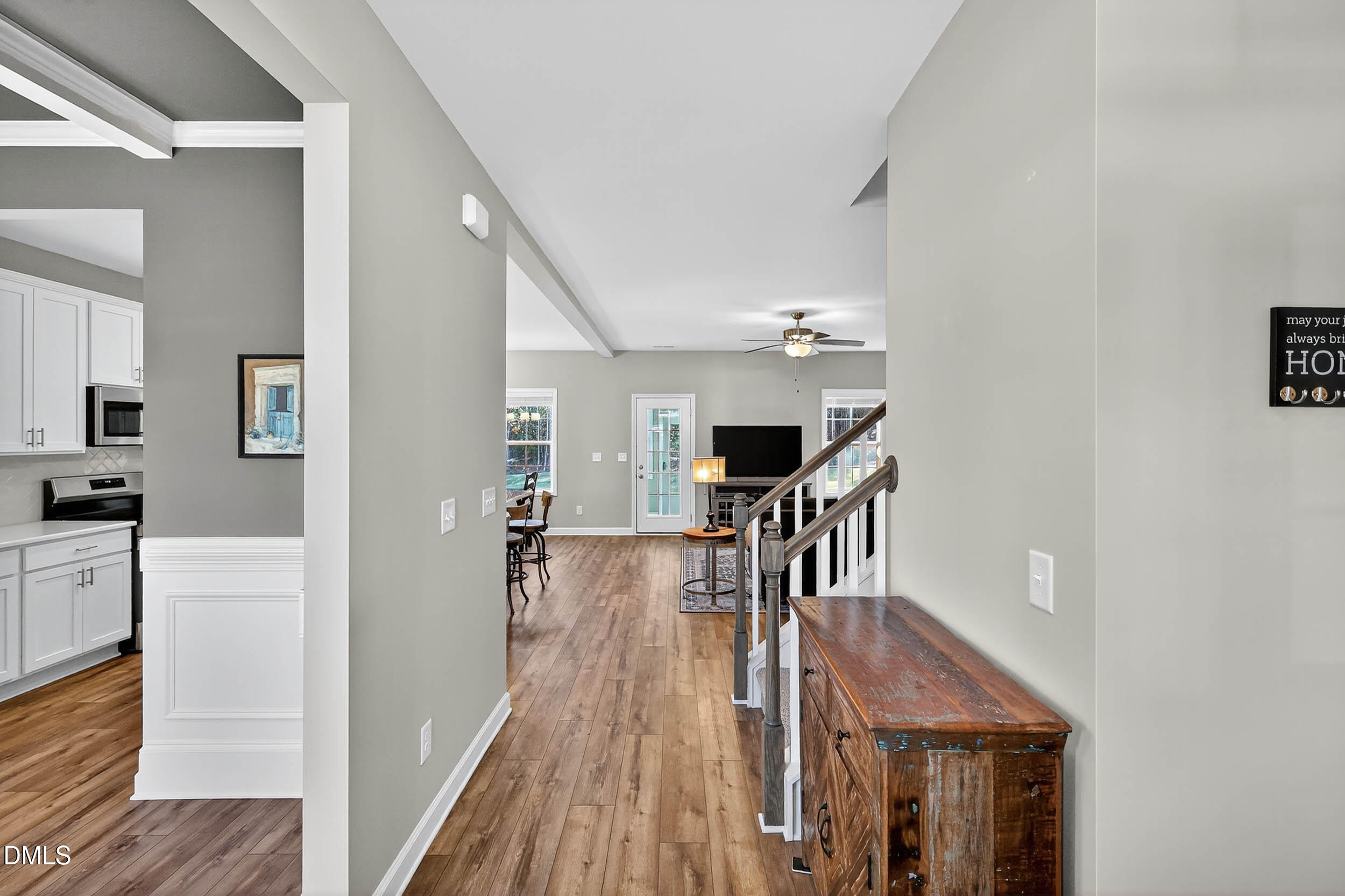 520 Husketh Road Youngsville, NC 27596 - Photo 5 of 63 a view of a hallway with furniture and wooden floor