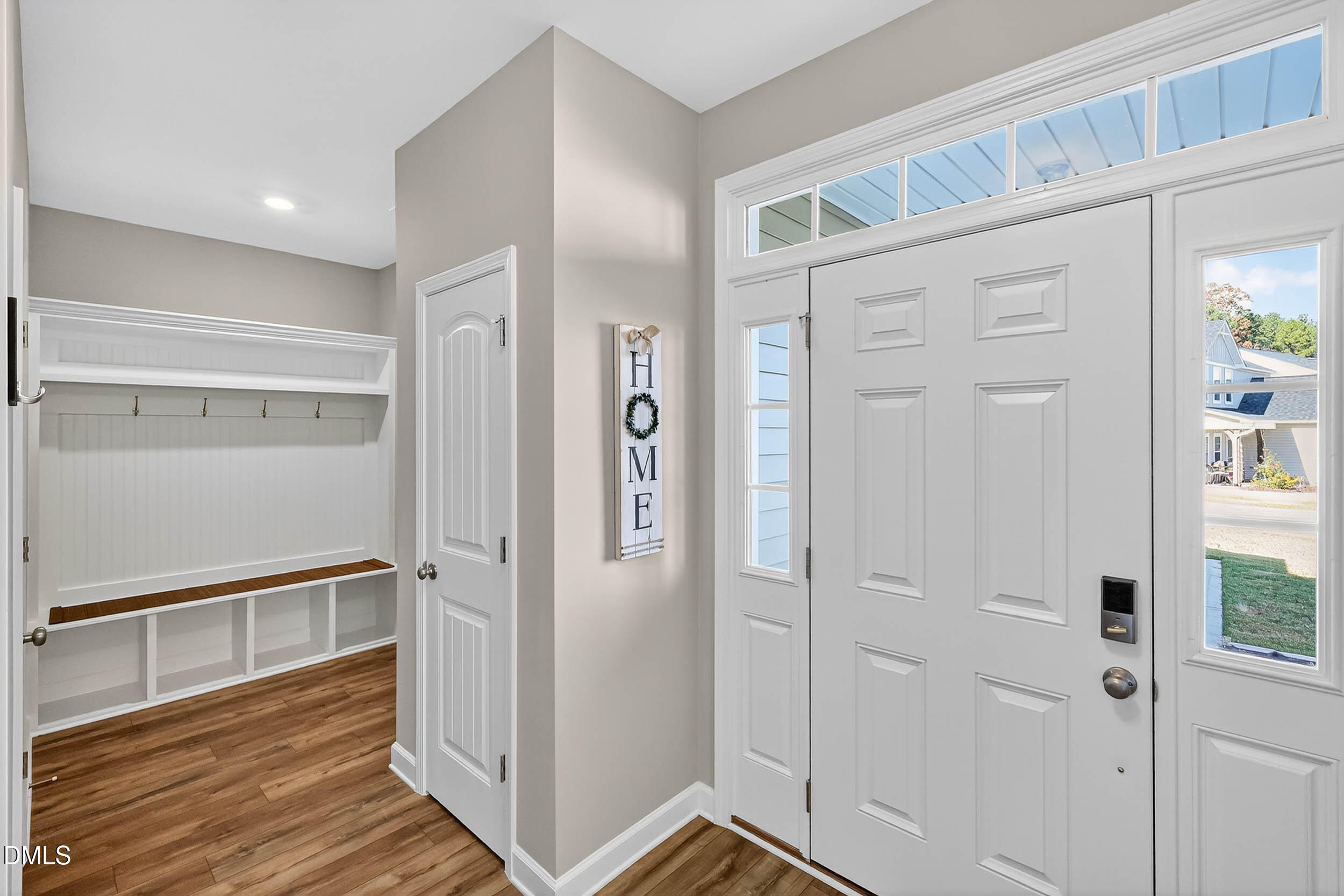 520 Husketh Road Youngsville, NC 27596 - Photo 6 of 63 a view of a hallway with wooden floor