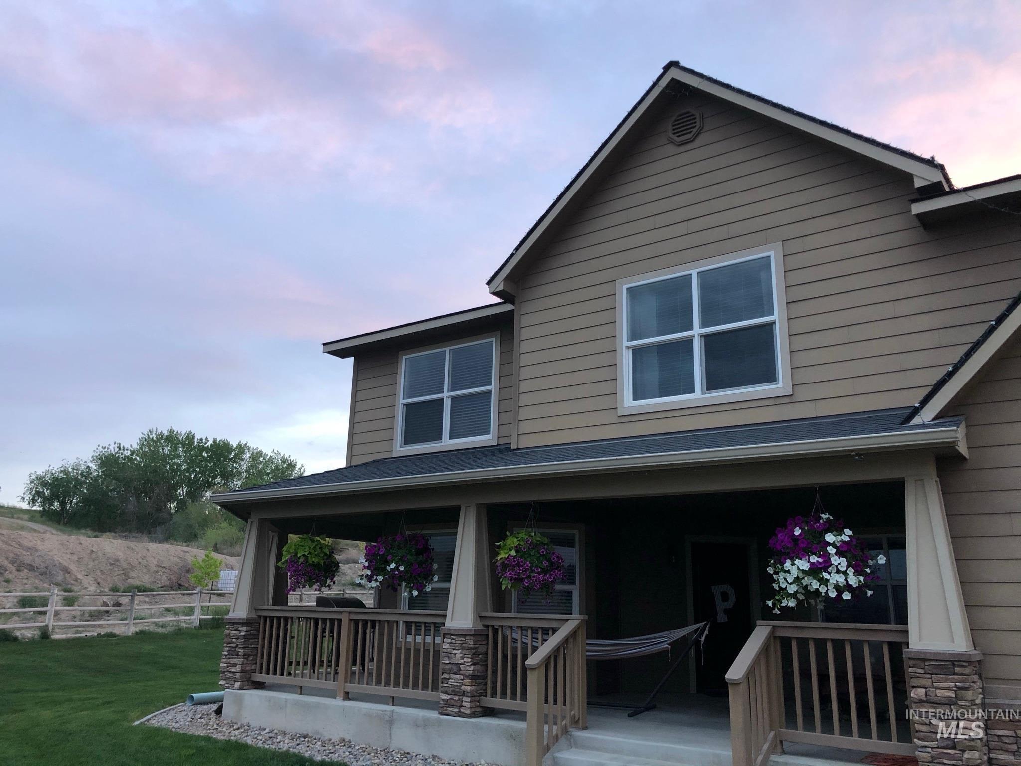 3091 Echo Road Nyssa, OR 97913 - Photo 2 of 36 Craftsman-style house with a porch and stone siding